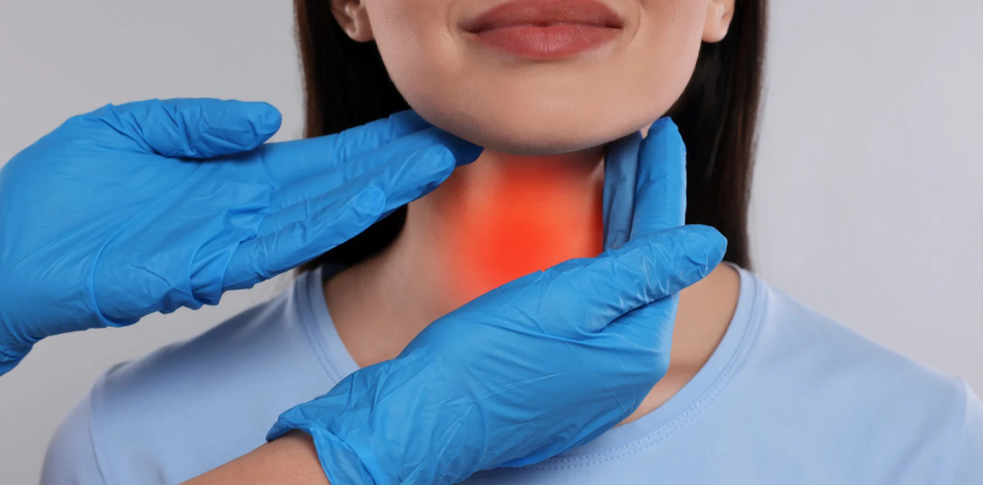 Doctor checking patient's  throat.