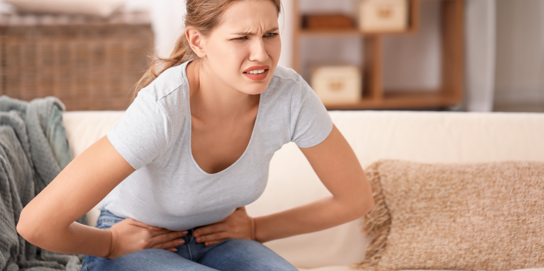 Woman in stomach pain.