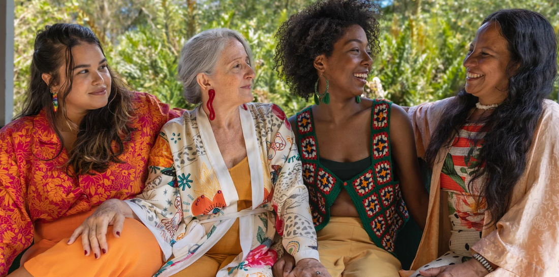 Four smiling diverse women.