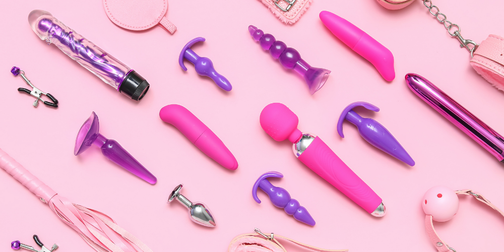 The photo is a collection of toys in magenta, purple, and pink colors.