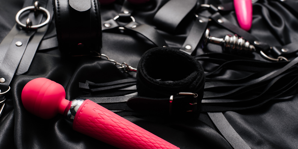 The image is a close-up of a black and red object, identified as headphones. It is tagged as a tool, everyday carry item, suitable for indoor use, and features the color red.