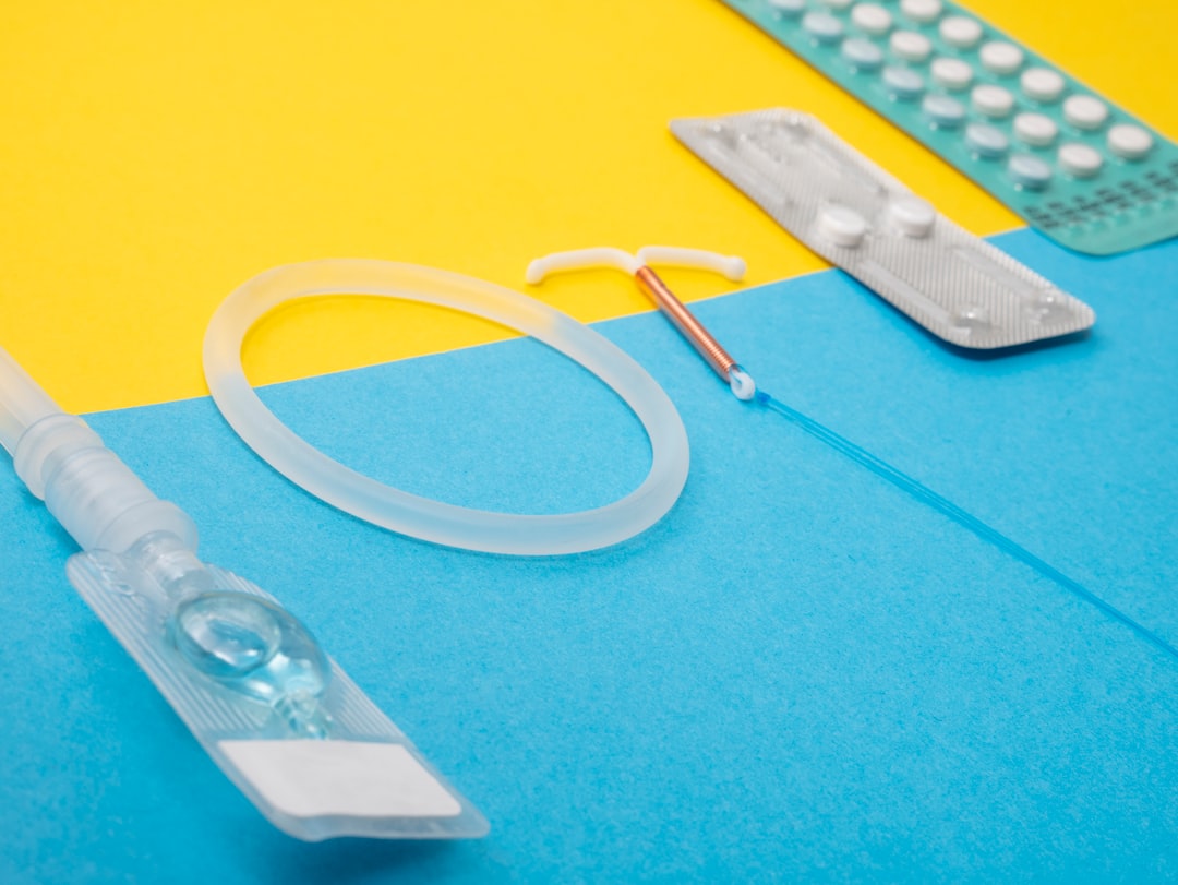 a medical device is laying on a blue and yellow surface