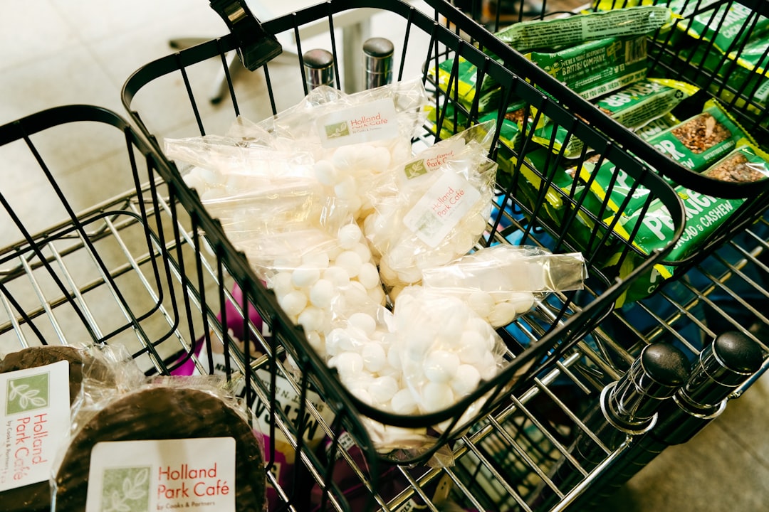 A shopping cart filled with lots of food