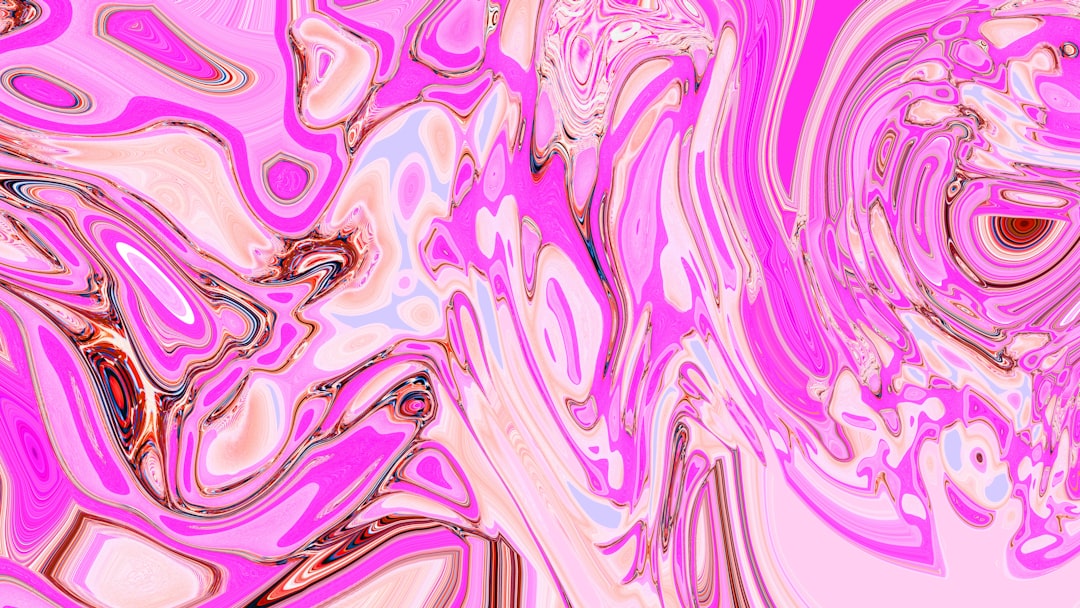 Abstract swirling pink and white marble effect.