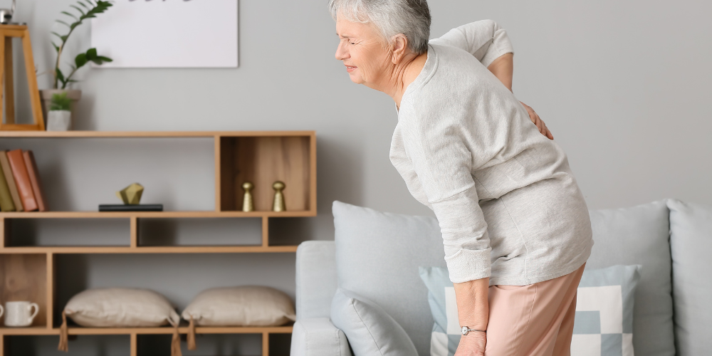 an old woman having back pain