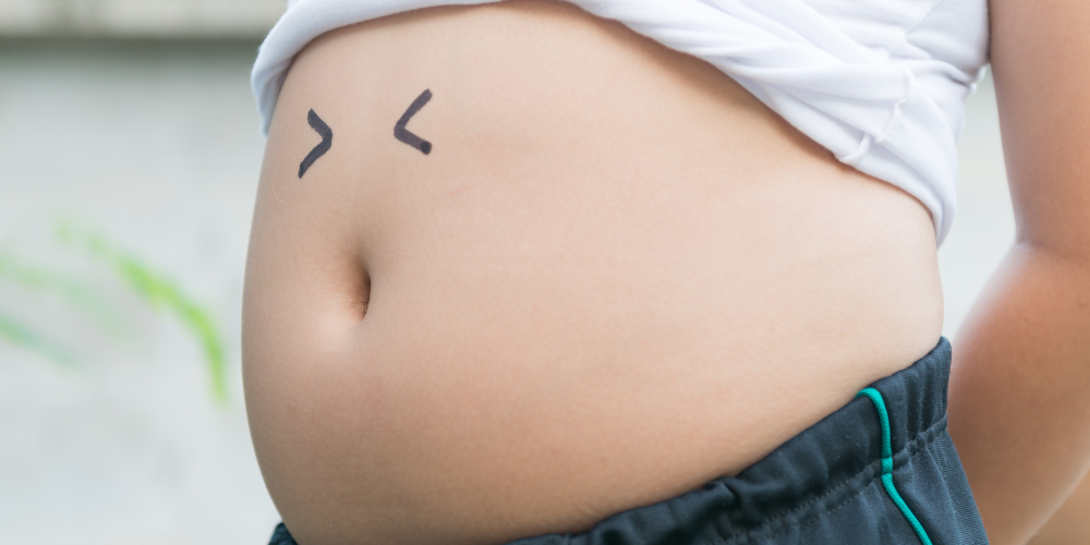 a person's stomach bloating