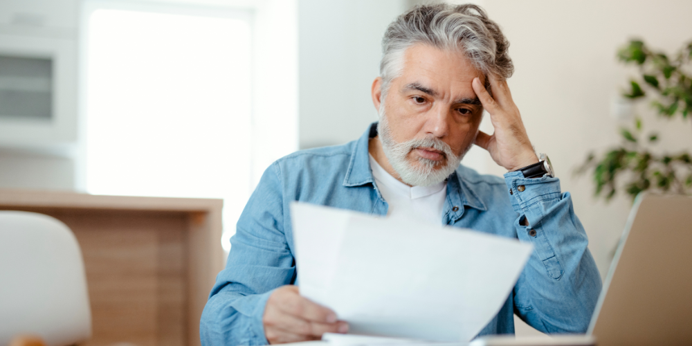 a man reading a paper