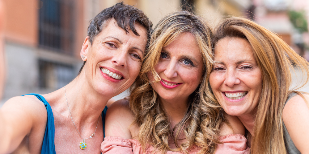 three women taking a selfie