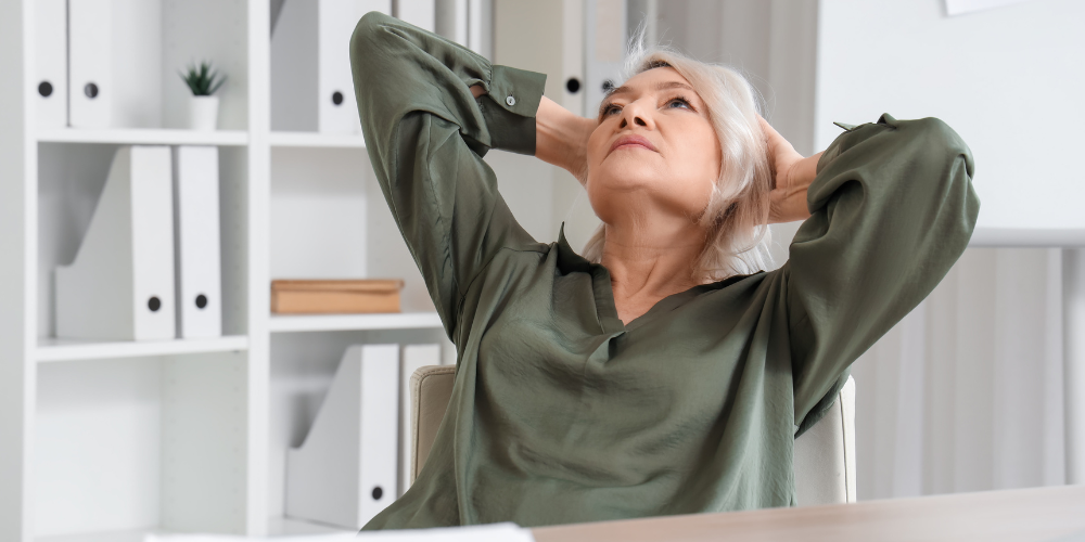 The image shows a woman indoors.