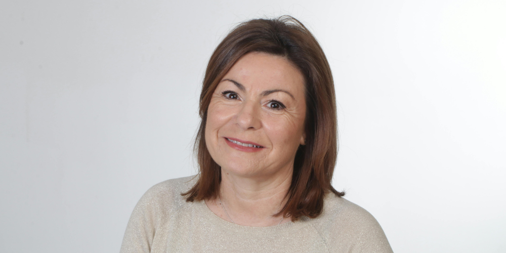 a woman with a plain brown top