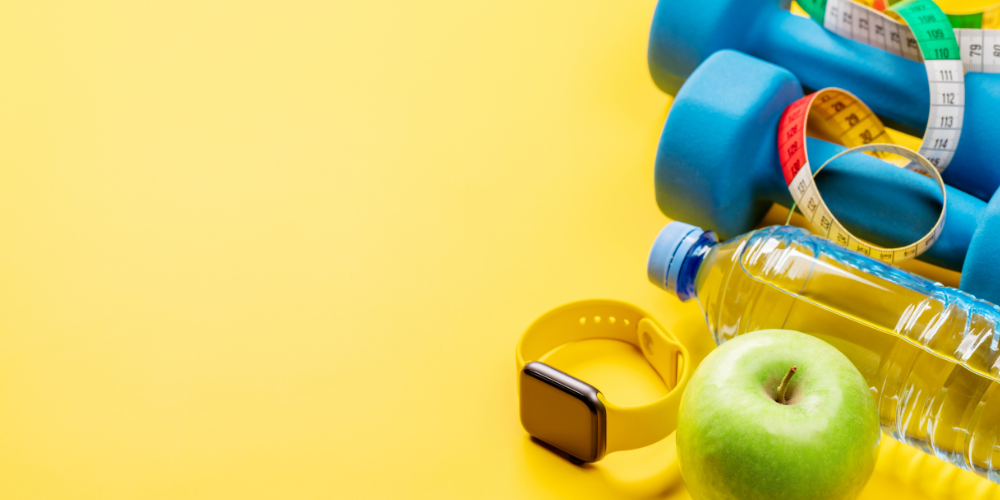 exercise equipment, fruits and a water bottle