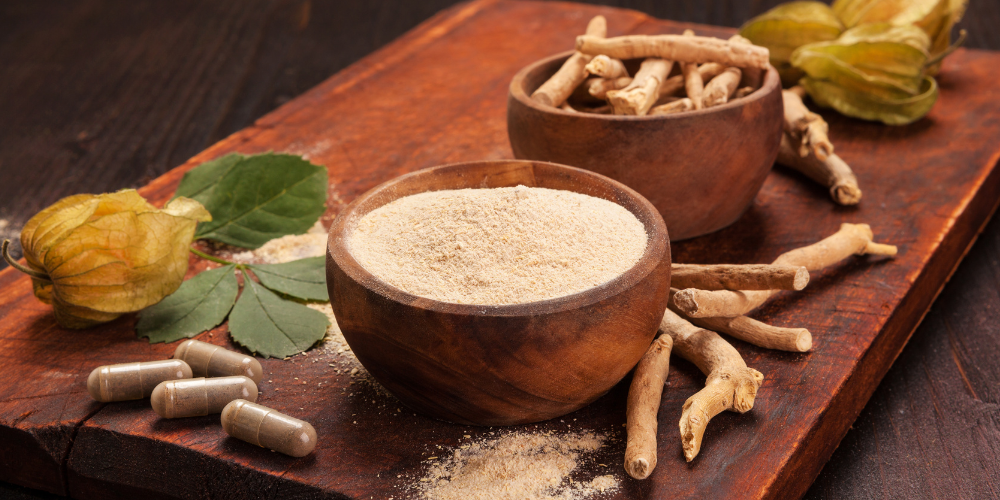 a bowl full of powder and herbs