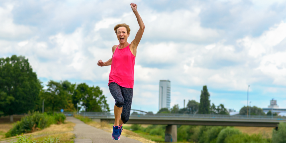 a woman running outdoors