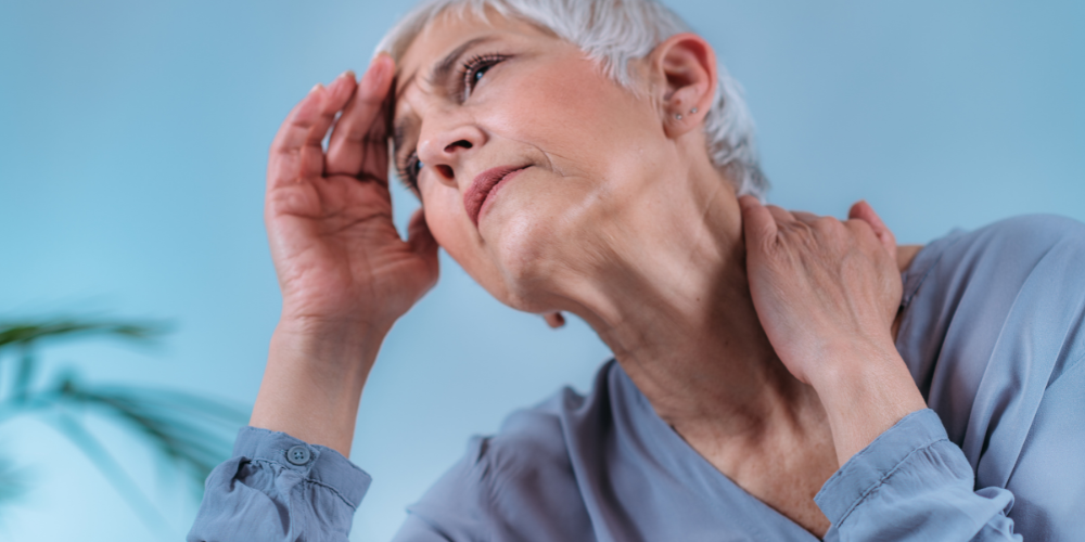 a woman seems to be having a headache