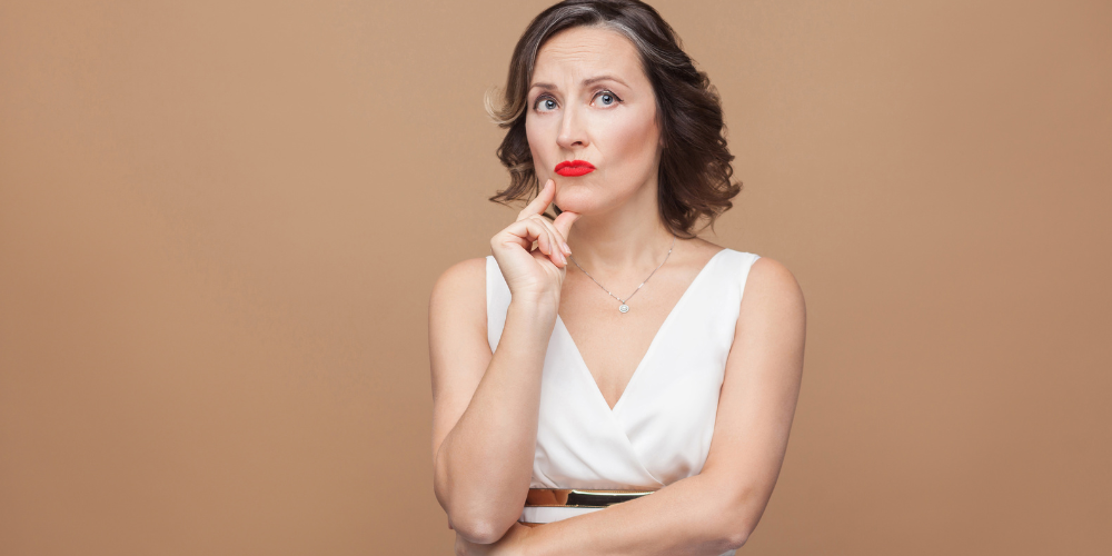 a woman wearing a white top