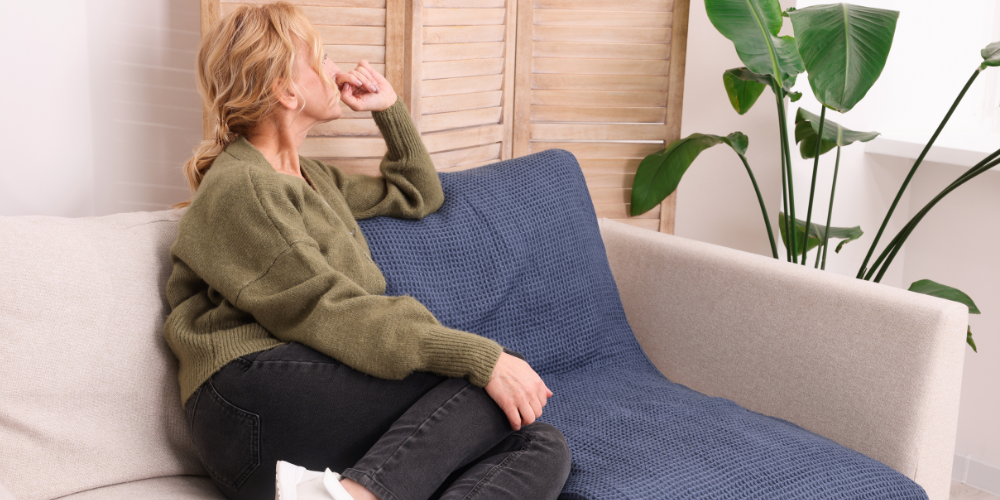 a woman sitting indoors