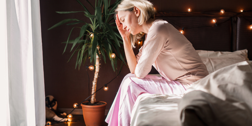 a woman sitting in bed